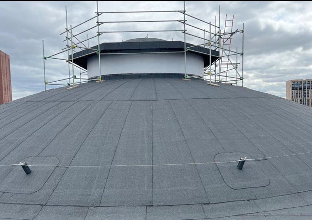 Domed roof covering to a sports hall